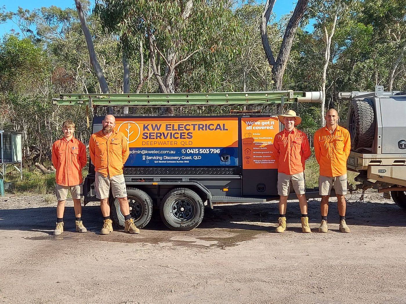 The KW Electrical Services team with their work trailer, Deepwater QLD